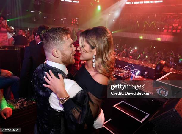 Boxer Canelo Alvarez and Fernanda Gomez celebrate during his after-fight party at Jewel Nightclub at the Aria Resort & Casino on May 6, 2017 in Las...