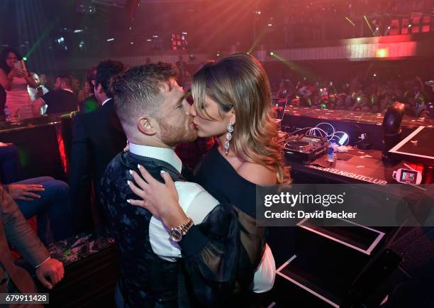 Boxer Canelo Alvarez and Fernanda Gomez celebrate during his after-fight party at Jewel Nightclub at the Aria Resort & Casino on May 6, 2017 in Las...