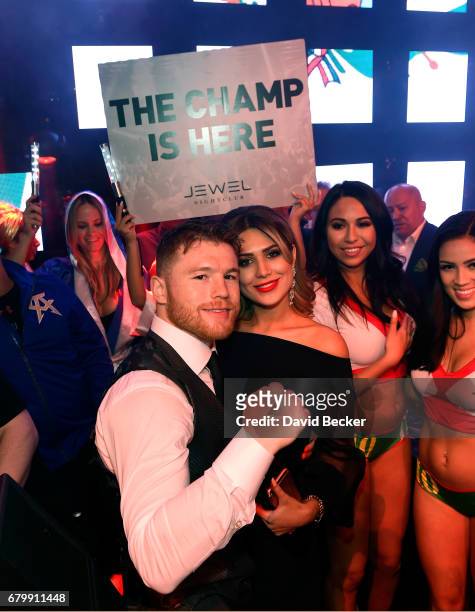 Boxer Canelo Alvarez and Fernanda Gomez celebrate during his after-fight party at Jewel Nightclub at the Aria Resort & Casino on May 6, 2017 in Las...