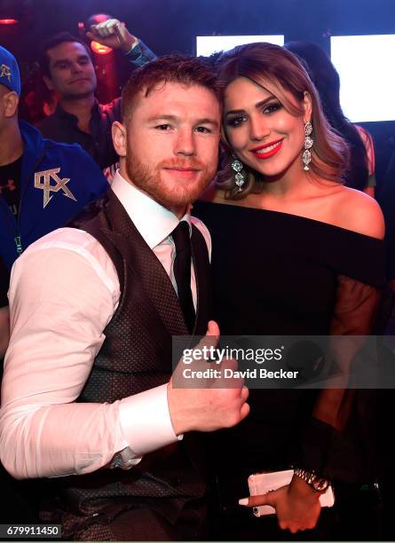 Boxer Canelo Alvarez and Fernanda Gomez celebrate during his after-fight party at Jewel Nightclub at the Aria Resort & Casino on May 6, 2017 in Las...