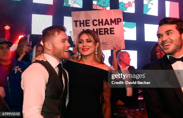 Boxer Canelo Alvarez and Fernanda Gomez celebrate during his after-fight party at Jewel Nightclub at the Aria Resort & Casino on May 6, 2017 in Las...