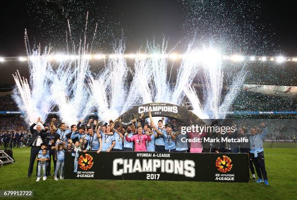 Sydney FC players celebrate with the trophy after winning the 2017 A-League Grand Final match between Sydney FC and the Melbourne Victory at Allianz...