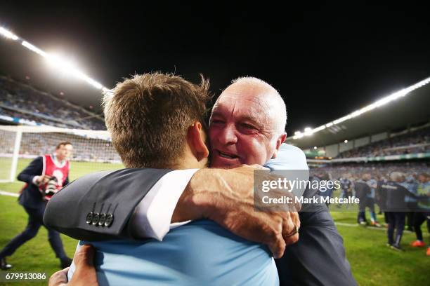 Sydney FC head coach Graham Arnold and Milos Ninkovic celebrate winning the 2017 A-League Grand Final match between Sydney FC and the Melbourne...