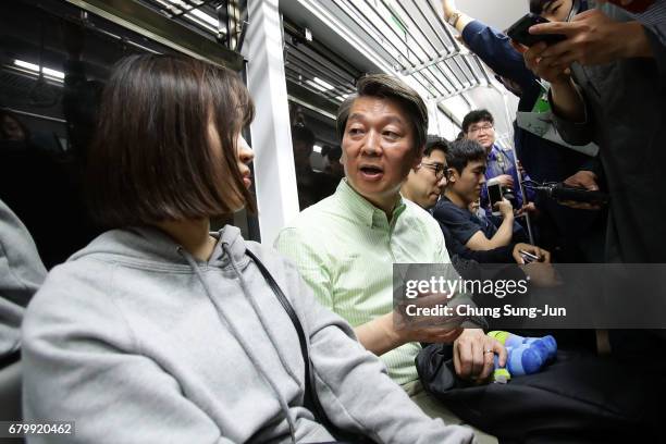 South Korean presidential candidate Ahn Cheol-Soo of the People's Party meets with people during his street election campaign on May 7, 2017 in...