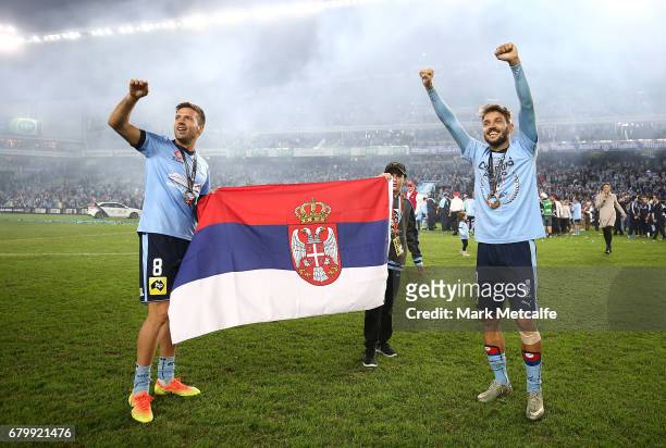 Milos Ninkovic and Milos Dimitrijevic of Sydney FC celebrate winning the 2017 A-League Grand Final match between Sydney FC and the Melbourne Victory...