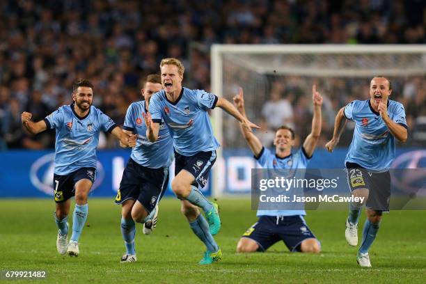 Michael Zullo, Brandon O'Neill, Matt Simon, Rhyan Grant of Sydney celebate winning the 2017 A-League Grand Final match between Sydney FC and the...