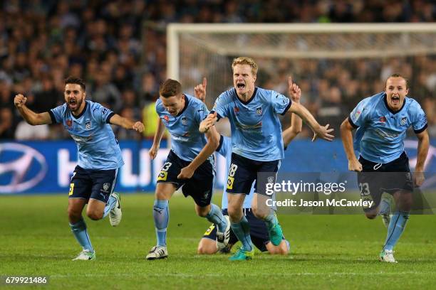 Michael Zullo, Brandon O'Neill, Matt Simon, Rhyan Grant of Sydney celebate winning the 2017 A-League Grand Final match between Sydney FC and the...