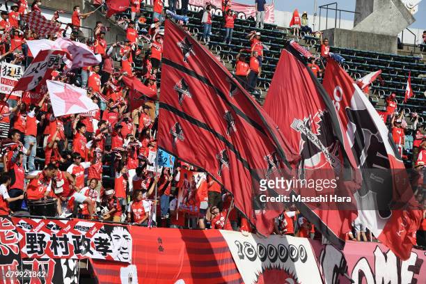 Roasso Kumaomoto Supporters cheer prior to the J.League J2 match between Roasso Kumamoto and Thespa Kusatsu Gunma at Egao Kenko Stadium on May 7,...