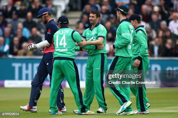 Ireland's Tim Murtagh celebrates with Gary Wilson after bowling out Alex Hales of England during the Royal London ODI between England and Ireland at...