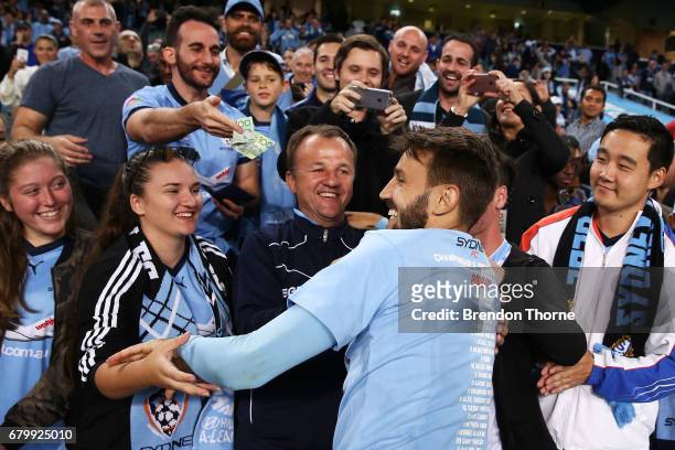 Milos Ninkovic of Sydney celebrates with fans at full time following the 2017 A-League Grand Final match between Sydney FC and the Melbourne Victory...