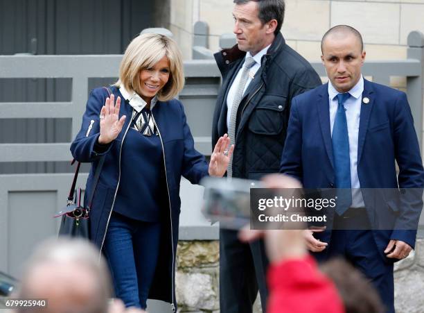Wife of French presidential election candidate for the 'En Marche!' political movement, Emmanuel Macron, Brigitte Trogneux leaves her home prior her...
