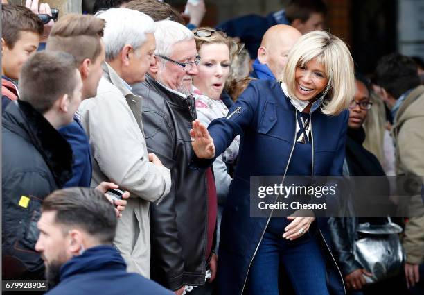 Wife of French presidential election candidate for the 'En Marche!' political movement, Emmanuel Macron, Brigitte Trogneux leaves the polling station...