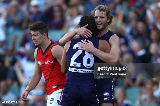 David Mundy of the Dockers celebrates a goal with Brady Grey during the round seven AFL match between the Fremantle Dockers and the Essendon Bombers...