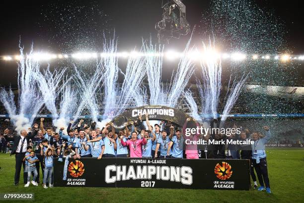 Sydney FC players celebrate with the trophy after winning the 2017 A-League Grand Final match between Sydney FC and the Melbourne Victory at Allianz...