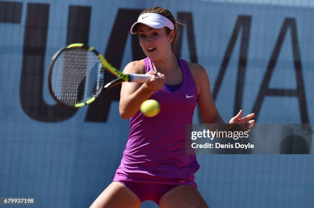 Catherine Bellis of USA in action against Daria Gavrilova of Australia during day two of the Mutua Madrid Open tennis at La Caja Magica on May 7,...