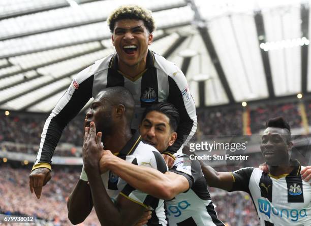 Chancel Mbemba of Newcastle United celebrates scoring his sides second goal with his Newcastle United team mates during the Sky Bet Championship...