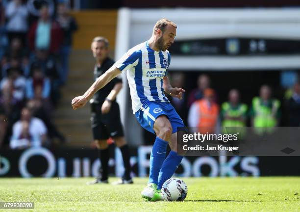 Glenn Murray of Brighton and Hove Albion scores his sides first goal from the penalty spot during the Sky Bet Championship match between Aston Villa...