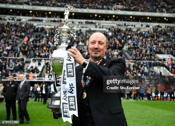 Rafael Benitez, Manager of Newcastle United celebrates with the Championship trophy after the Sky Bet Championship match between Newcastle United and...