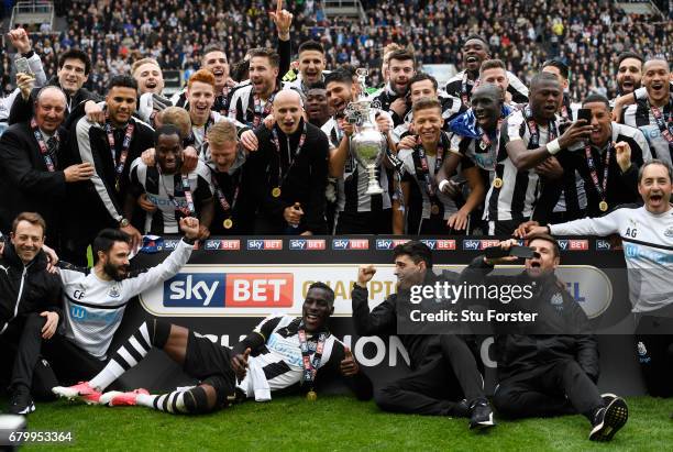 Ayoze Perez of Newcastle United and his Newcastle United team mates celebrate with the Championship Trophy after the Sky Bet Championship match...