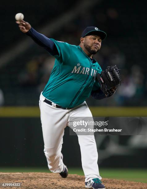 Reliever Jean Machi of the Seattle Mariners delivers a pitch during a game against the Texas Rangers at Safeco Field on May 5, 2017 in Seattle,...