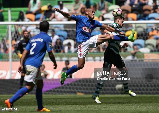 Belenenses's forward Maurides from Brazil with Sporting CP's defender Sebastian Coates from Uruguay in action during the Primeira Liga match between...