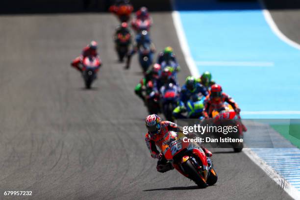 Dani Pedrosa of Spain and the Repsol Honda Team leads the field ahead of Marc Marquez of Spain and the Repsol Honda Team during the MotoGP of Spain...