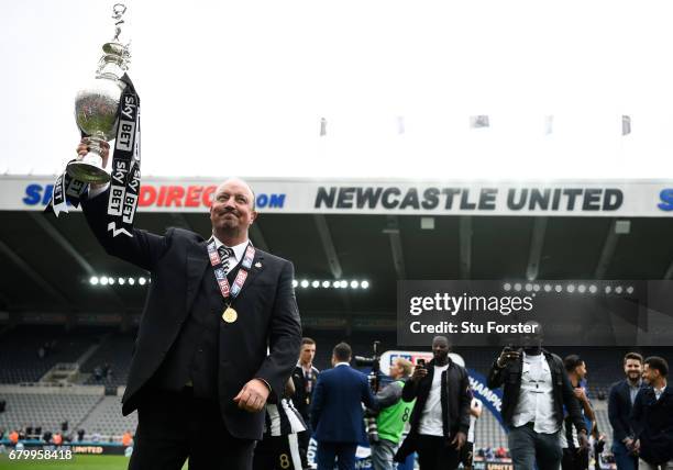 Rafael Benitez, Manager of Newcastle United celebrates with the Championship trophy after the Sky Bet Championship match between Newcastle United and...