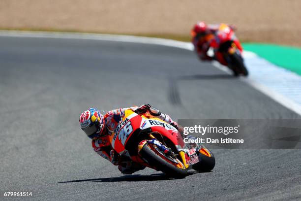 Dani Pedrosa of Spain and the Repsol Honda Team leads Marc Marquez of Spain and the Repsol Honda Team during the MotoGP of Spain at Circuito de Jerez...