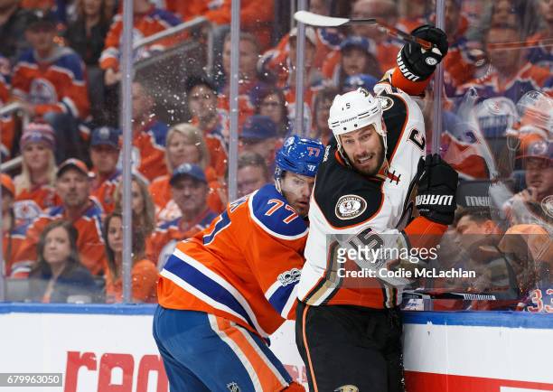 Oscar Klefbom of the Edmonton Oilers battles against Ryan Getzlaf of the Anaheim Ducks in Game Four of the Western Conference Second Round during the...