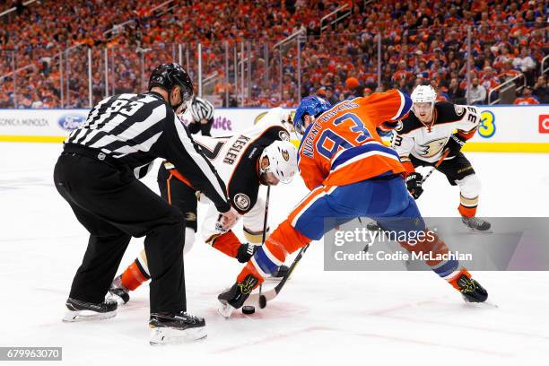 Ryan Nugent-Hopkins of the Edmonton Oilers faces off against Ryan Kesler of the Anaheim Ducks in Game Four of the Western Conference Second Round...