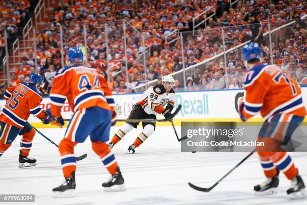 Mark Letestu, Zack Kassian and Oscar Klefbom of the Edmonton Oilers watch Jakob Silfverberg of the Anaheim Ducks in Game Four of the Western...