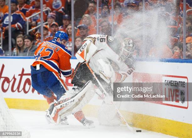 Anton Slepyshev of the Edmonton Oilers battles against goalie John Gibson of the Anaheim Ducks in Game Four of the Western Conference Second Round...