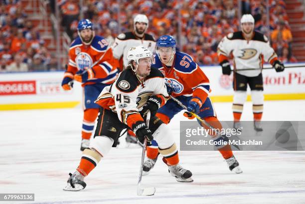 Connor McDavid of the Edmonton Oilers hassles Sami Vatanen of the Anaheim Ducks in Game Four of the Western Conference Second Round during the 2017...