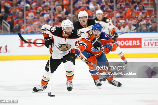 Oscar Klefbom of the Edmonton Oilers pursues Andrew Cogliano of the Anaheim Ducks in Game Four of the Western Conference Second Round during the 2017...