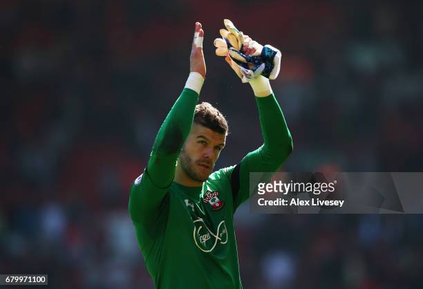 Fraser Forster of Southampton shows appreciation to the fans after the Premier League match between Liverpool and Southampton at Anfield on May 7,...