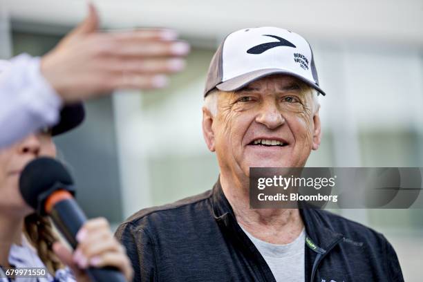 Tony Nicely, chief executive officer of the Government Employees Insurance Co. , waits to signal the start of the "Berkshire Hathaway Invest In...