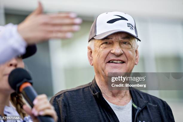 Tony Nicely, chief executive officer of the Government Employees Insurance Co. , waits to signal the start of the "Berkshire Hathaway Invest In...