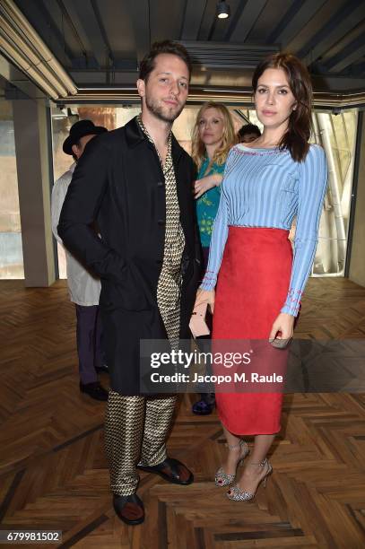 Derek Blasberg and Dasha Zhukova while attending the Prada Resort 2018 Womenswear Show in Osservatorio on May 7, 2017 in Milan, Italy.