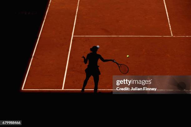 Caroline Wozniacki of Denmark in action against Monica Niculescu of Romania during day two of the Mutua Madrid Open tennis at La Caja Magica on May...