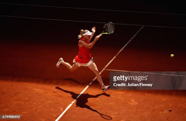 Caroline Wozniacki of Denmark in action against Monica Niculescu of Romania during day two of the Mutua Madrid Open tennis at La Caja Magica on May...