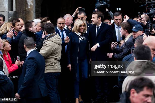 Founder and Leader of the political movement 'En Marche !' and presidential candidate Emmanuel Macron and his wife Brigitte Trogneux go to vote for...