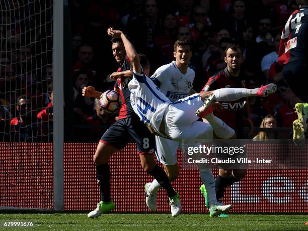 Ivan Perisic of FC Internazionale and Nicolas Burdisso of Genoa CFC compete for the ball during the Serie A match between Genoa CFC and FC...