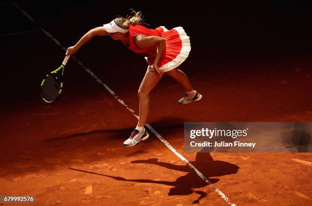 Caroline Wozniacki of Denmark in action against Monica Niculescu of Romania during day two of the Mutua Madrid Open tennis at La Caja Magica on May...