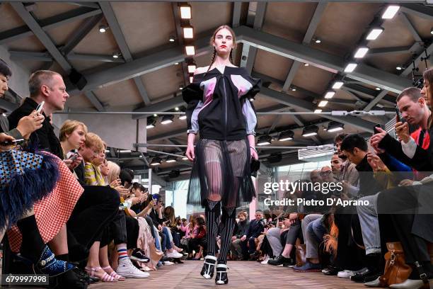 Model walks the runway at the Prada Resort Collection 2018 show at Osservatorio Prada on May 7, 2017 in Milan, Italy.