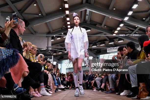 Model walks the runway at the Prada Resort Collection 2018 show at Osservatorio Prada on May 7, 2017 in Milan, Italy.