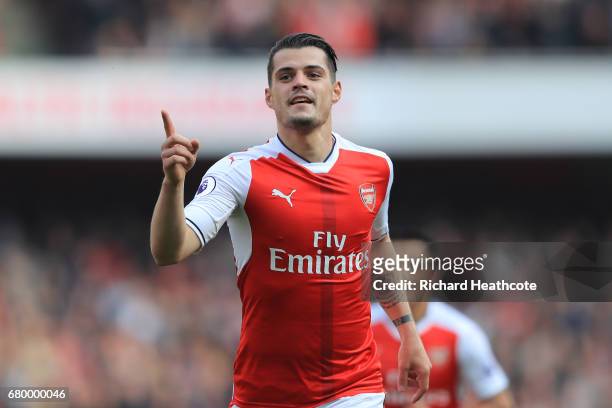 Granit Xhaka of Arsenal celebrates scoring his sides first goal during the Premier League match between Arsenal and Manchester United at the Emirates...