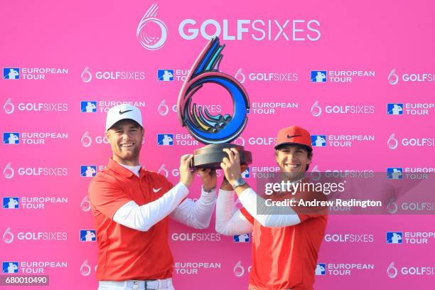 Thorbjorn Olesen and Lucas Bjerregaard of Denmark pose with the trophy after winning the final match between Denmark and Australia during day two of...