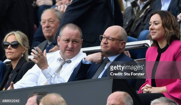 Newcastle United owner Mike Ashley and Lee Charnley look on during the Sky Bet Championship title after the match between Newcastle United and...