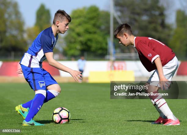 Left: Mladen Cvejtinovic of Hertha BSC U14 during the game of the 3rd place during the Nike Premier Cup 2017 on may 7, 2017 in Berlin, Germany.