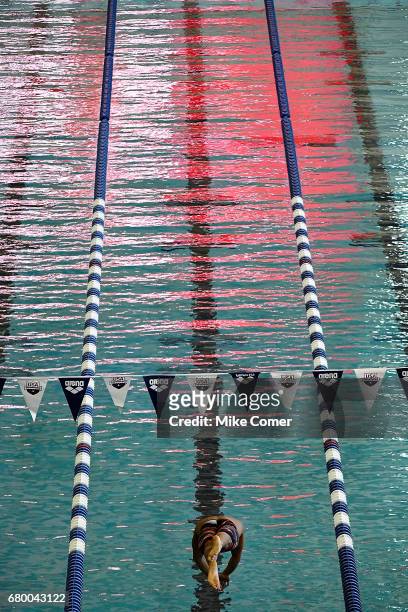 Tom Shields dives to start a heat of the Men's 200m Butterfly during the preliminary heats of day four of the Arena Pro Swim Series swim meet at the...